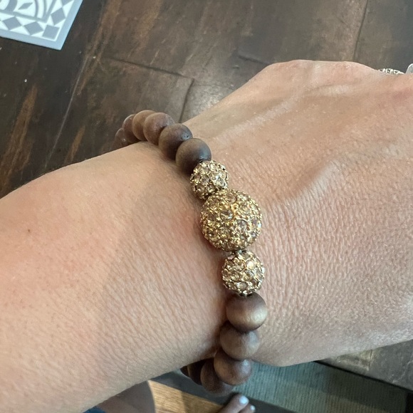 Stella & Dot, brown wood beads with gold center. Lovely piece. Stretch - Picture 1 of 4
